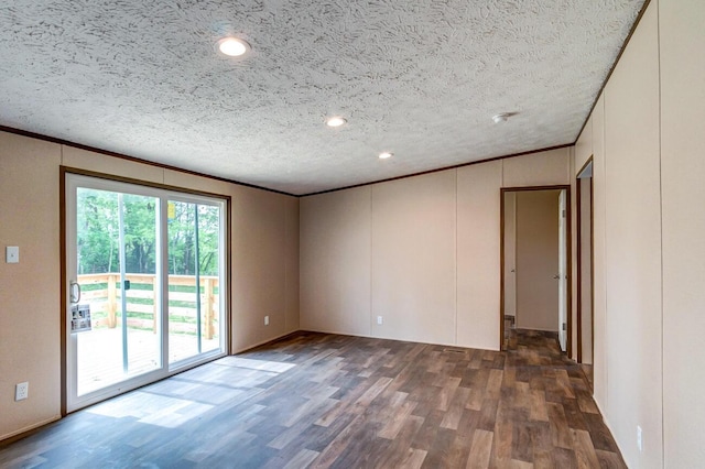 2832 Two Mile Rd, Winchester, KY 40391 - empty room featuring wood finished floors, crown molding, a textured ceiling, a decorative wall, and recessed lighting