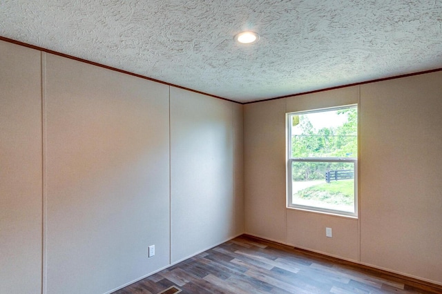 2832 Two Mile Rd, Winchester, KY 40391 - unfurnished room with ornamental molding, plenty of natural light, a textured ceiling, wood finished floors, and recessed lighting