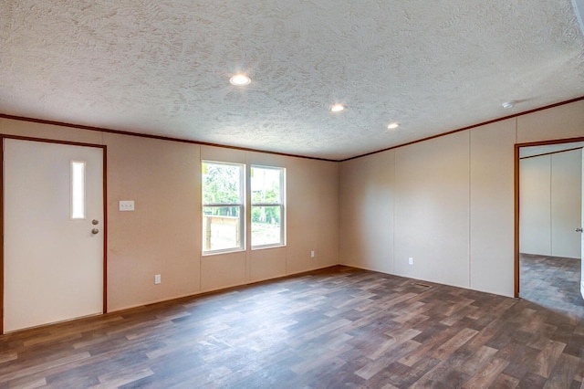 2832 Two Mile Rd, Winchester, KY 40391 - spare room with ornamental molding, wood finished floors, a textured ceiling, a decorative wall, and recessed lighting