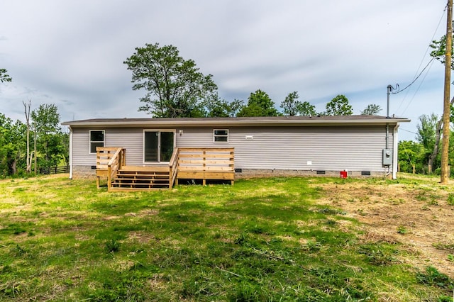 2832 Two Mile Rd, Winchester, KY 40391 - rear view of house featuring crawl space, a deck, and a lawn