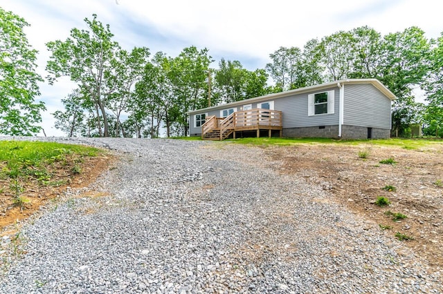 2832 Two Mile Rd, Winchester, KY 40391 - manufactured / mobile home with a wooden deck and crawl space