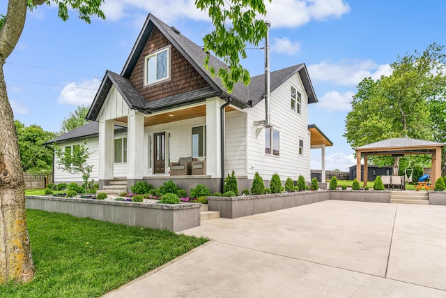 1251 Wilmore Rd, Nicholasville, KY 40356 - view of front facade with a gazebo, a porch, board and batten siding, and roof with shingles