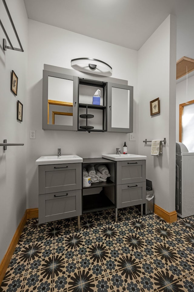 3786 Shoemaker Rdg, Beattyville, KY 41311 - bathroom featuring baseboards and two vanities