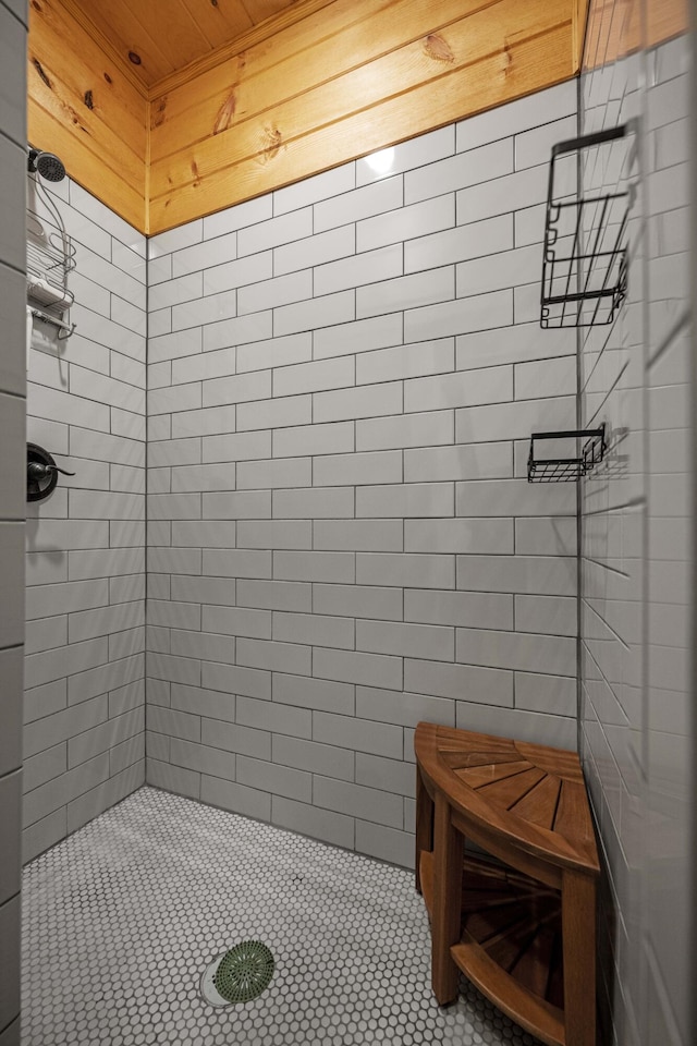 3786 Shoemaker Rdg, Beattyville, KY 41311 - full bathroom featuring tiled shower, wood ceiling, and wooden walls