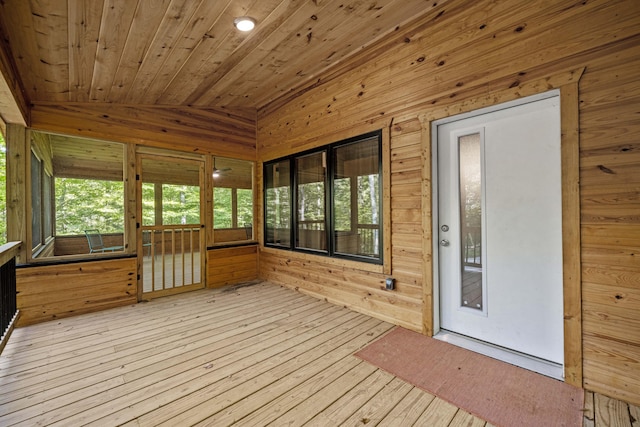 3786 Shoemaker Rdg, Beattyville, KY 41311 - unfurnished sunroom with wooden walls, healthy amount of natural light, wood-type flooring, wooden ceiling, and vaulted ceiling