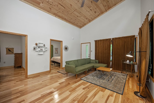 3786 Shoemaker Rdg, Beattyville, KY 41311 - living room with high vaulted ceiling, light wood-style floors, wood ceiling, a ceiling fan, and baseboards