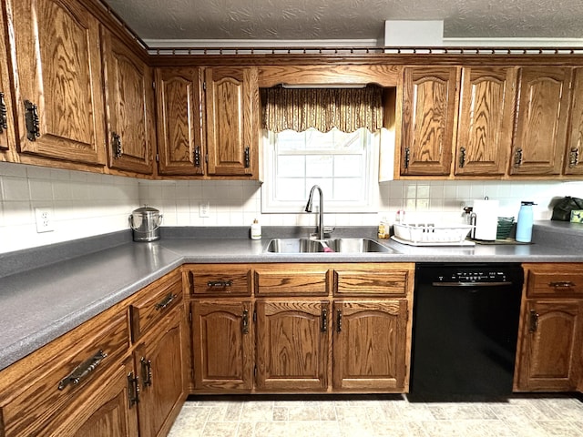 498 Winding Blade Rd, East Bernstadt, KY 40729 - kitchen with black dishwasher, a sink, tasteful backsplash, and brown cabinets