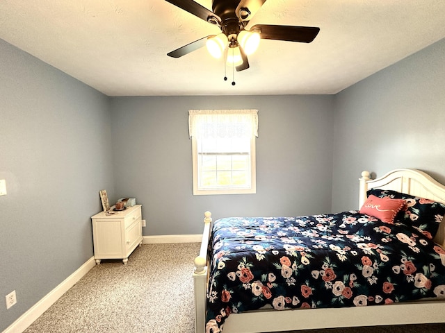498 Winding Blade Rd, East Bernstadt, KY 40729 - bedroom with light colored carpet, baseboards, and a ceiling fan