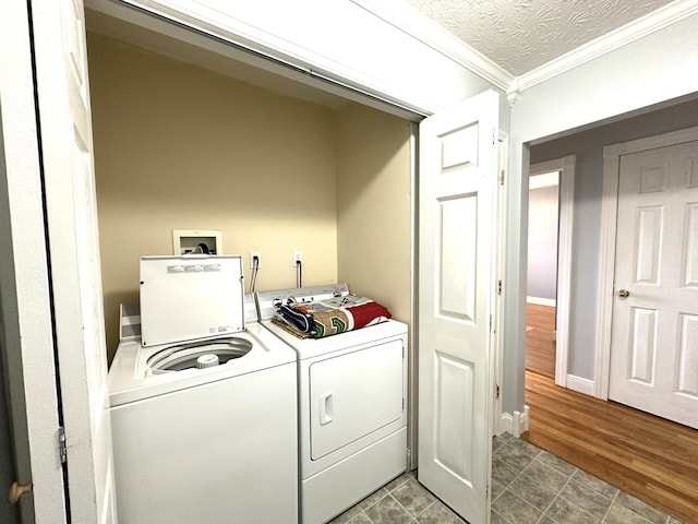 498 Winding Blade Rd, East Bernstadt, KY 40729 - laundry room featuring independent washer and dryer, crown molding, and tile patterned flooring