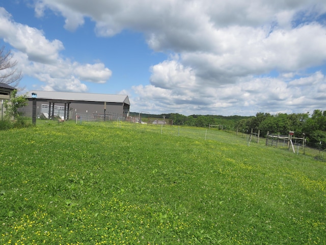 498 Winding Blade Rd, East Bernstadt, KY 40729 - view of yard featuring a pole building and an outdoor structure