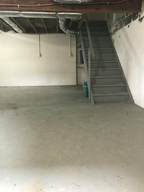 498 Winding Blade Rd, East Bernstadt, KY 40729 - unfinished below grade area featuring stairway