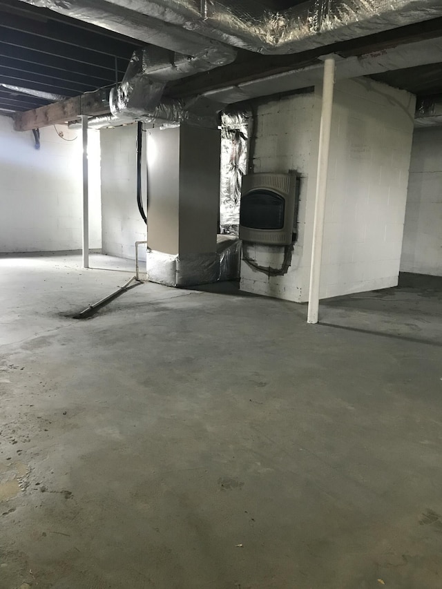 498 Winding Blade Rd, East Bernstadt, KY 40729 - unfinished basement featuring heating unit
