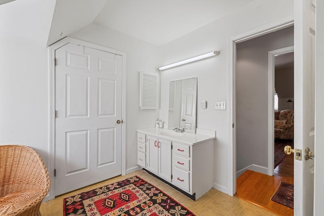 1483 Cypress St, Paris, KY 40361 - bathroom with vanity, wood finished floors, baseboards, and lofted ceiling