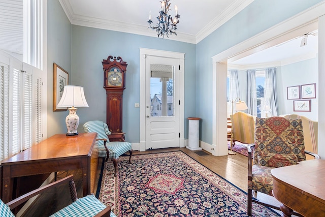 1483 Cypress St, Paris, KY 40361 - entryway featuring healthy amount of natural light, wood finished floors, ornamental molding, a chandelier, and baseboards