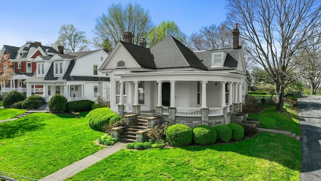 1483 Cypress St, Paris, KY 40361 - view of front of house with covered porch, a front lawn, and a chimney