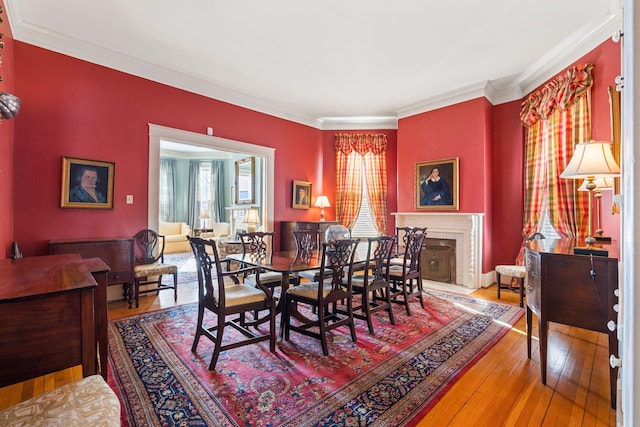 1483 Cypress St, Paris, KY 40361 - dining room with ornamental molding, hardwood / wood-style flooring, and a fireplace with flush hearth