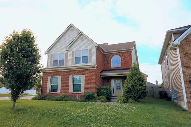 2592 Mable Ln, Lexington, KY 40511 - traditional-style home featuring a front yard and brick siding