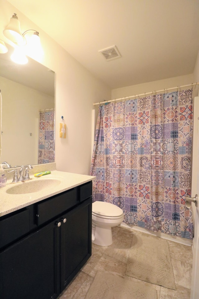 2592 Mable Ln, Lexington, KY 40511 - full bath featuring vanity, toilet, and a shower with shower curtain