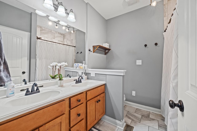 929 Lauderdale Dr, Lexington, KY 40515 - bathroom with double vanity, a shower with curtain, toilet, and baseboards