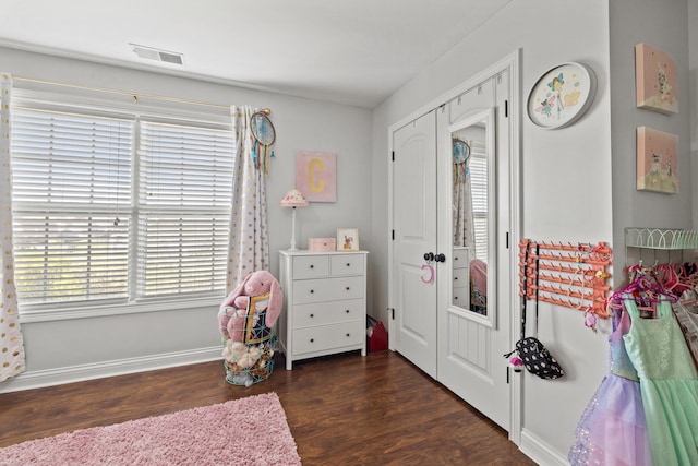 929 Lauderdale Dr, Lexington, KY 40515 - bedroom with multiple windows, wood finished floors, and baseboards