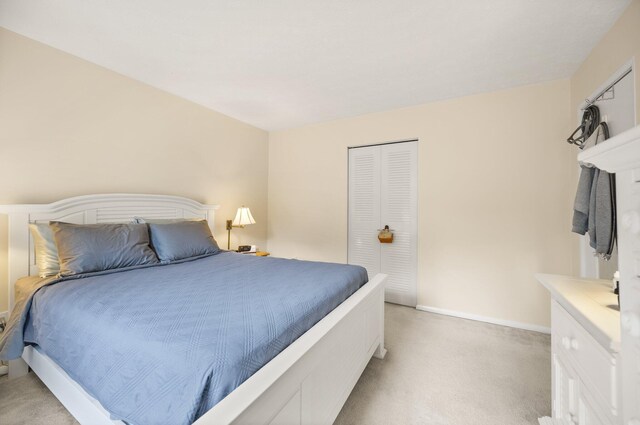 42-1 Woodson Bend Resort, Bronston, KY 42518 - bedroom featuring light carpet, a closet, and baseboards