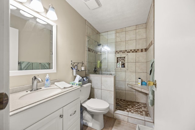 42-1 Woodson Bend Resort, Bronston, KY 42518 - bathroom with walk in shower, toilet, vanity, and wood finished floors