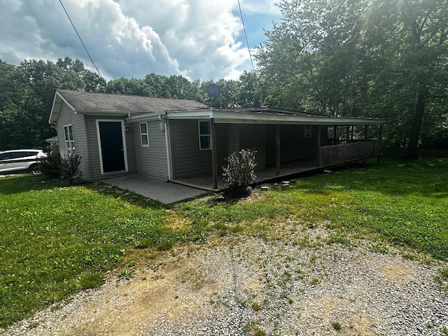 1901 Holly Grove Rd, Corbin, KY 40701 - rear view of property with a lawn