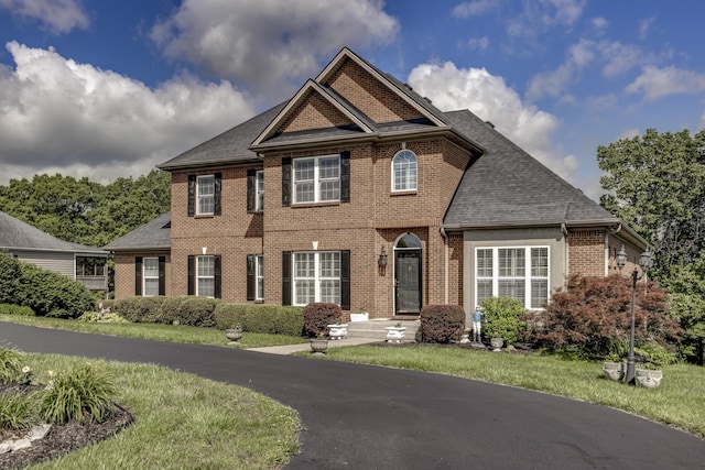 115 Old Bridge Rd, Danville, KY 40422 - colonial house with brick siding, a front lawn, and a shingled roof