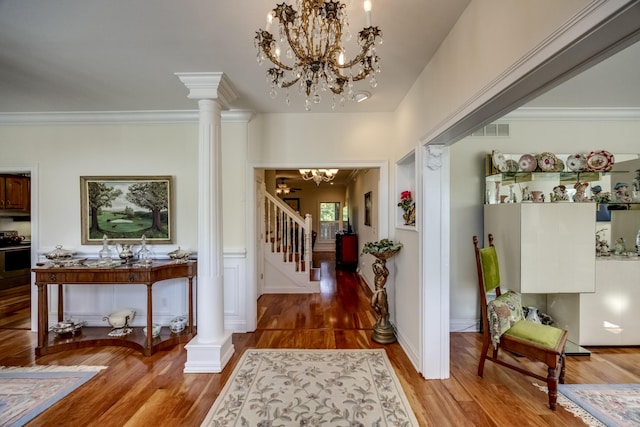 115 Old Bridge Rd, Danville, KY 40422 - entrance foyer featuring a chandelier, decorative columns, light wood-style floors, stairway, and crown molding