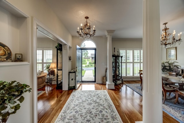 115 Old Bridge Rd, Danville, KY 40422 - foyer entrance featuring a chandelier, ornate columns, wood finished floors, and crown molding