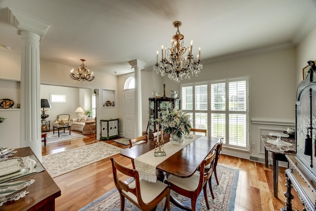 115 Old Bridge Rd, Danville, KY 40422 - dining room with a chandelier, ornate columns, plenty of natural light, light wood-style flooring, and ornamental molding