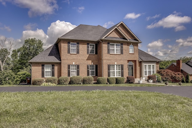 115 Old Bridge Rd, Danville, KY 40422 - view of front of home with a front lawn, brick siding, and a shingled roof
