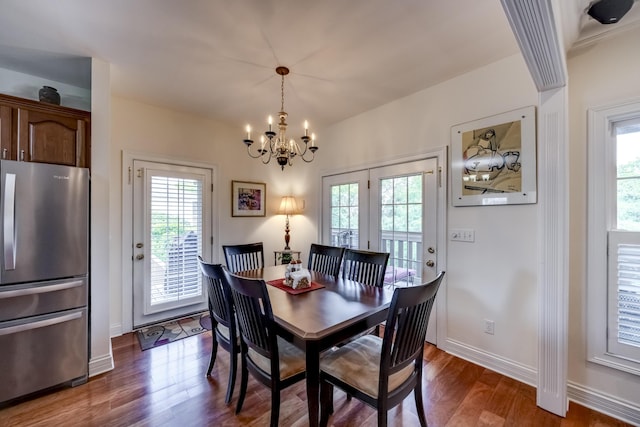115 Old Bridge Rd, Danville, KY 40422 - dining space with a chandelier, dark wood-style floors, and baseboards