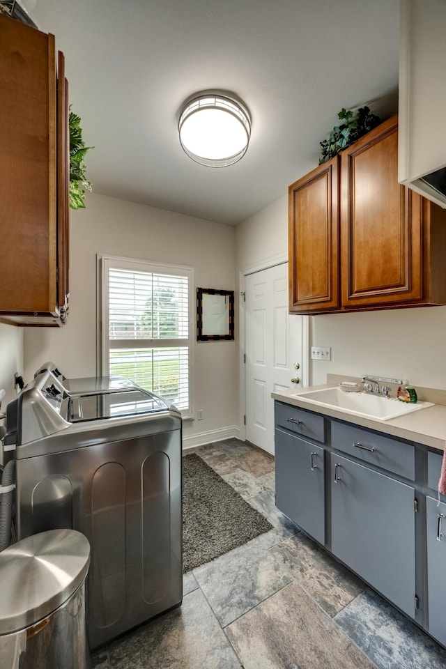 115 Old Bridge Rd, Danville, KY 40422 - kitchen with a sink, washer and dryer, light stone finish flooring, brown cabinets, and light countertops