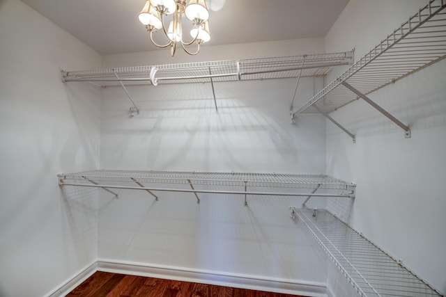 115 Old Bridge Rd, Danville, KY 40422 - walk in closet featuring wood finished floors and a chandelier