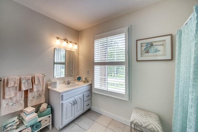 115 Old Bridge Rd, Danville, KY 40422 - full bath featuring vanity, tile patterned flooring, plenty of natural light, and baseboards