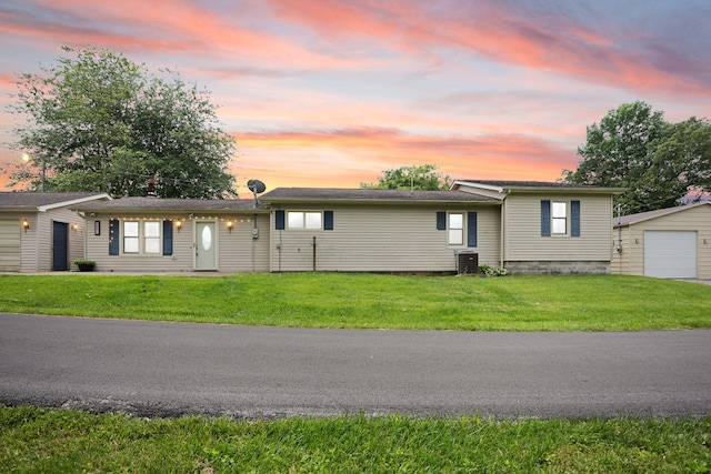 99 Wilson Ln, London, KY 40741 - ranch-style home with a garage, a front yard, and an outbuilding