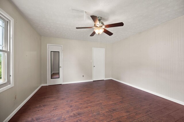 99 Wilson Ln, London, KY 40741 - empty room with hardwood / wood-style floors, a textured ceiling, a ceiling fan, and baseboards
