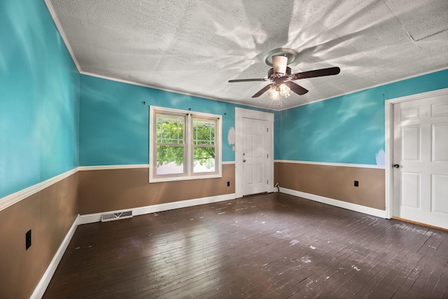 99 Wilson Ln, London, KY 40741 - spare room featuring ceiling fan, wood-type flooring, a textured ceiling, baseboards, and crown molding