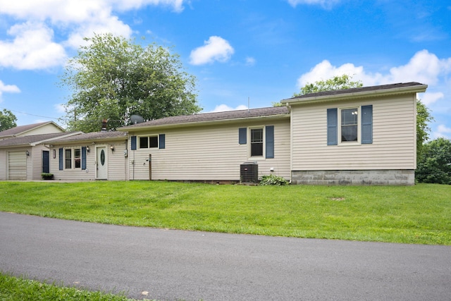 99 Wilson Ln, London, KY 40741 - single story home featuring a front lawn and central AC unit