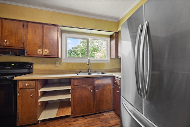 99 Wilson Ln, London, KY 40741 - kitchen with freestanding refrigerator, black electric range oven, under cabinet range hood, a sink, and ornamental molding