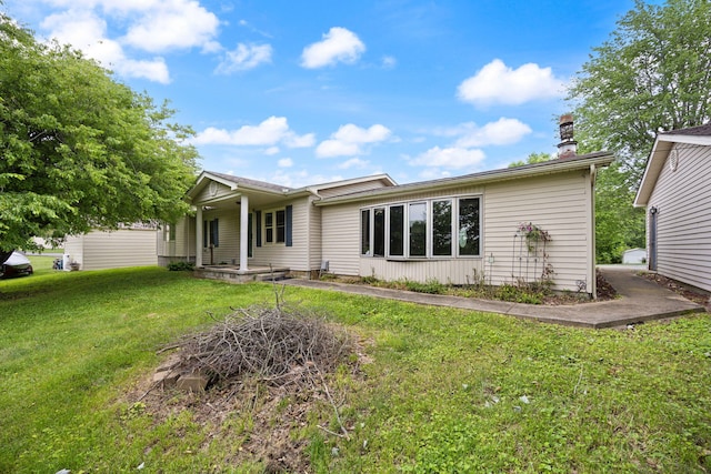 99 Wilson Ln, London, KY 40741 - back of property with a yard and a chimney