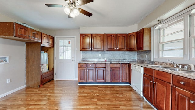 220 Johnson Ln, Berea, KY 40403 - kitchen featuring white dishwasher, a sink, gas water heater, a ceiling fan, and light wood finished floors