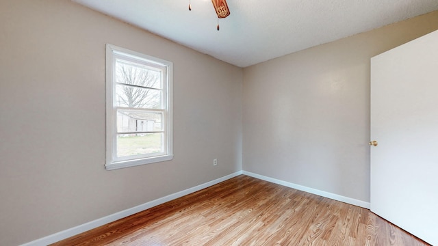 220 Johnson Ln, Berea, KY 40403 - unfurnished room with plenty of natural light, light wood-style floors, and baseboards