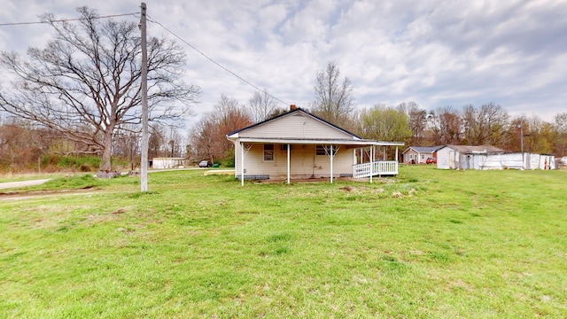 220 Johnson Ln, Berea, KY 40403 - rear view of property with a yard and covered porch