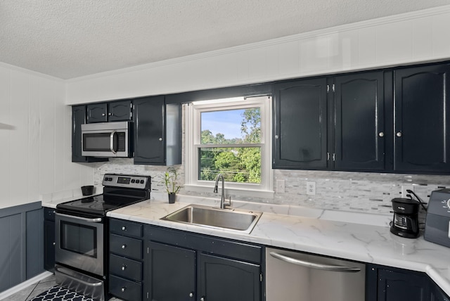 126 Frankie Dr, Richmond, KY 40475 - kitchen featuring appliances with stainless steel finishes, ornamental molding, a sink, tasteful backsplash, and a textured ceiling