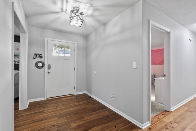 126 Frankie Dr, Richmond, KY 40475 - foyer entrance with hardwood / wood-style flooring, baseboards, and a textured ceiling