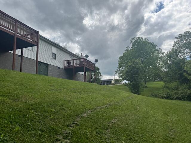 77 Bethy Rd, London, KY 40744 - view of grassy yard with a deck