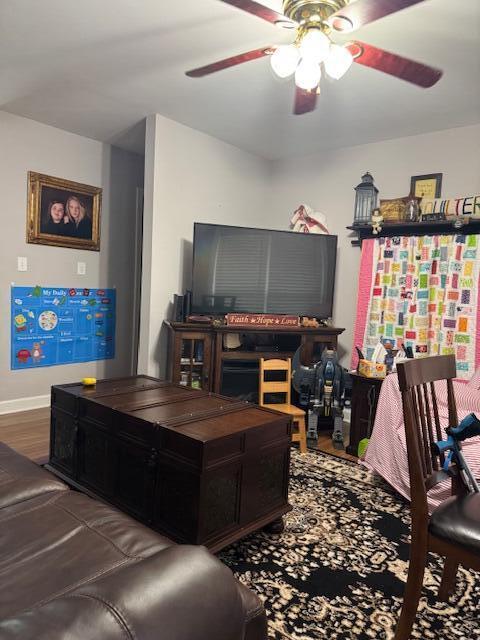 77 Bethy Rd, London, KY 40744 - living room with ceiling fan, wood finished floors, and baseboards