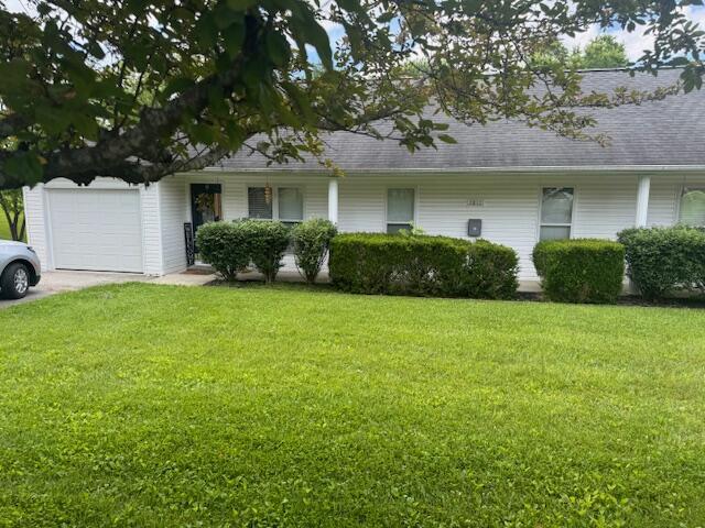 77 Bethy Rd, London, KY 40744 - ranch-style house with a front lawn, a garage, and driveway